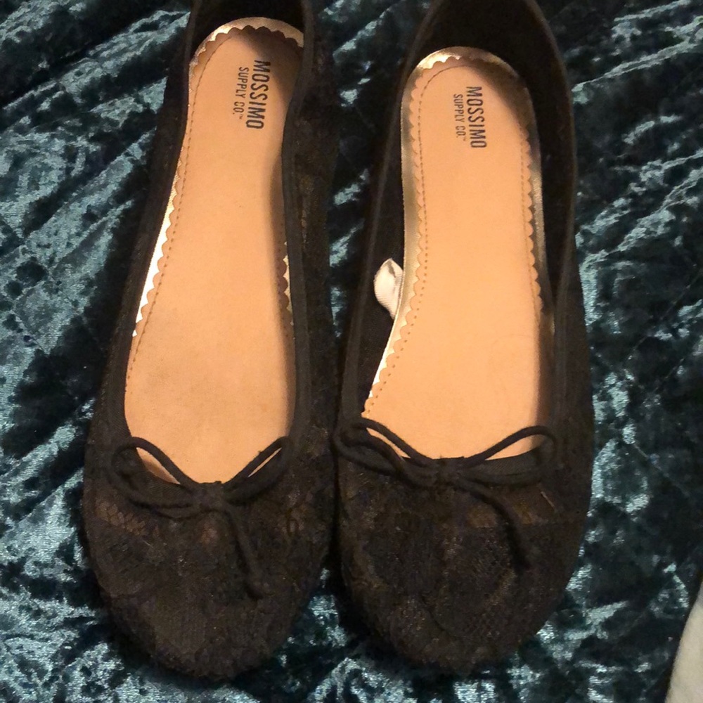 Black lace flats with bow detail